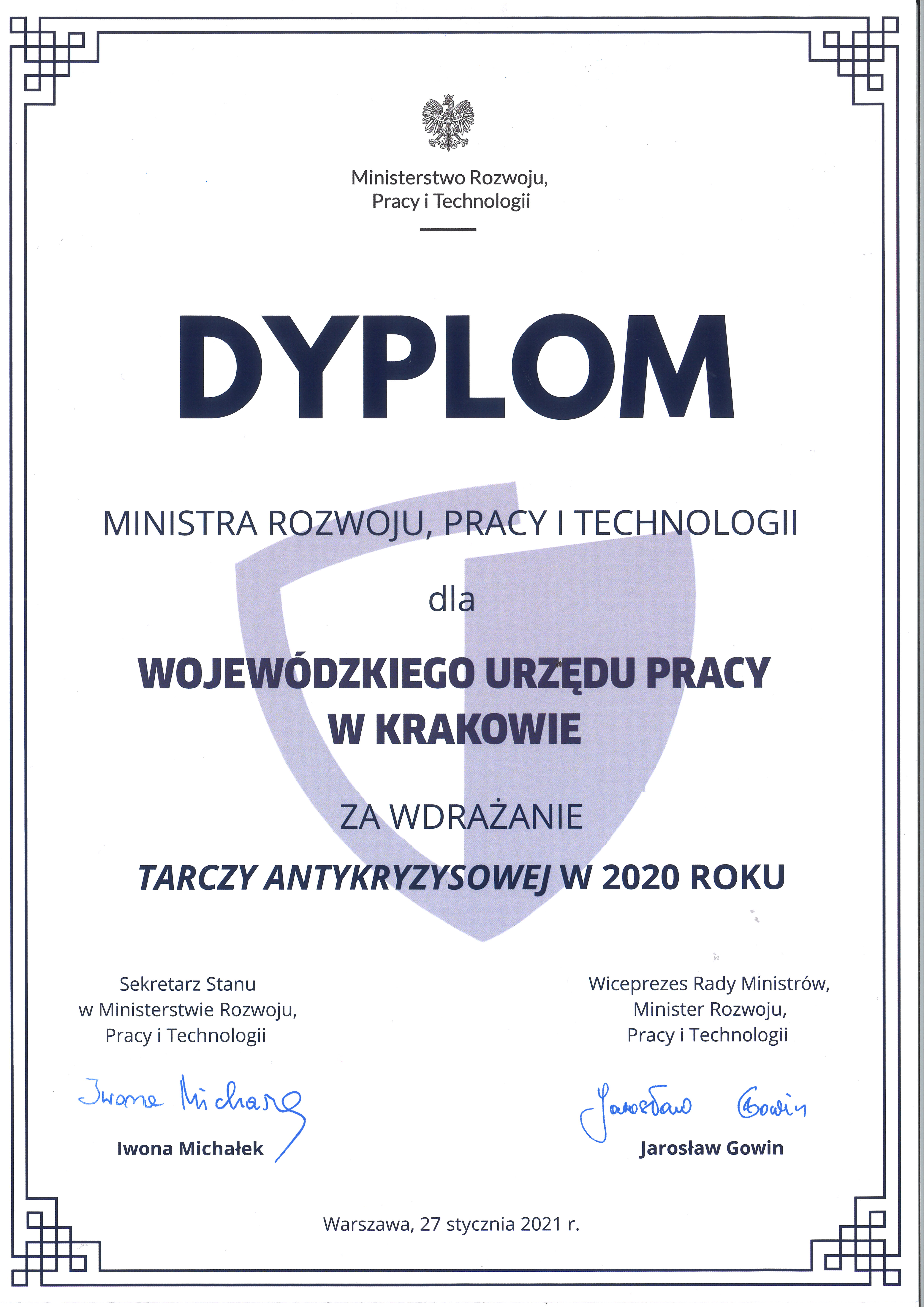 Dyplom Ministra Rozwoju, Pracy i Technologii dla Wojewódzkiego Urzędu Pracy w Krakowie za wdrażanie tarczy antykryzysowej 2020 roku. Wokół ozdobna oblamówka pod tekstem podpisy - autograf Pani Iwony Michałek, Sekretarz stanu oraz Pana Ministra Jarosława Gowina.